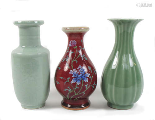 Two celadon-glazed vases and an enamelled sang-de-boeuf vase