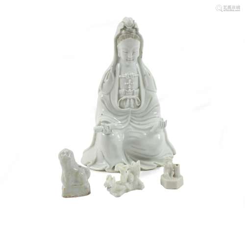 18th century A blanc-de-chine Guanyin, two blanc-de-chine joss-stick holders and a whistle