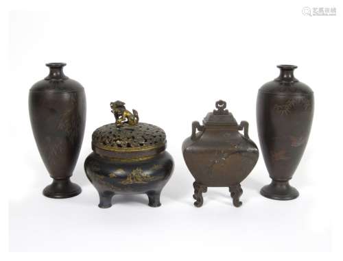 Meiji era A collection of inlaid bronze koros and covers together with a pair of vases