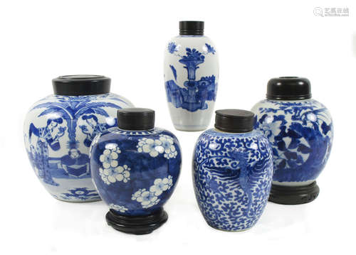 Five blue and white jars