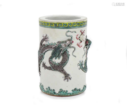 Kangxi six-character mark but later A brush pot with applied moulded decoration