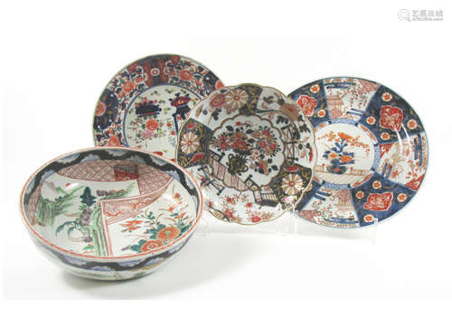 A collection of Kutani and Imari plates and dishes