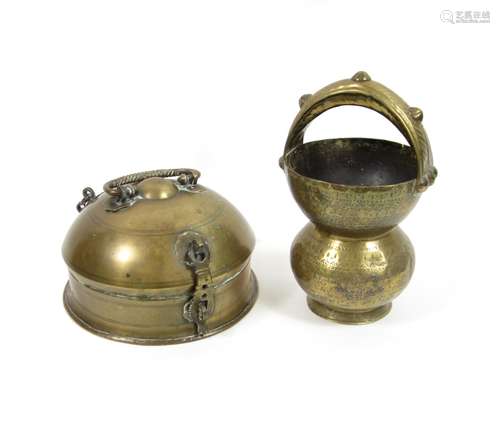 Tibet, 19th century A brass betel nut box and cover together with a brass vessel