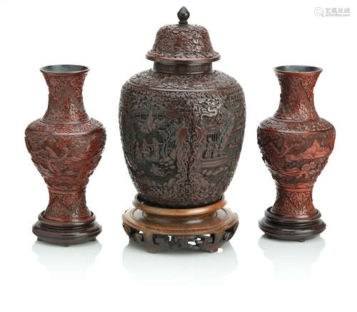 The jar with Qianlong six-character mark but later A cinnabar lacquer jar and cover together with a similar pair of vases