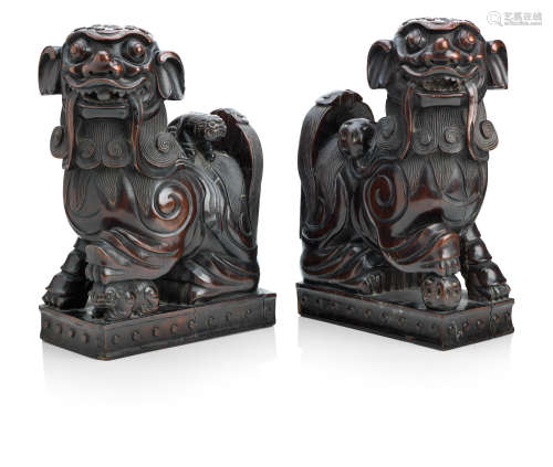 Late 19th century A pair of large hardwood lion dogs