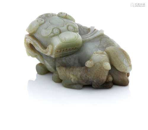 A jade Buddhist lion and pup