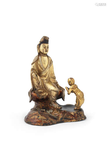 Ming Dynasty A gilt-bronze group of Guanyin and Sudhana