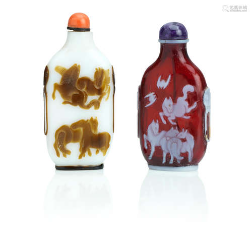 Yangzhou school, 19th century Two overlay glass 'Eight Horses of Mu Wang' snuff bottles