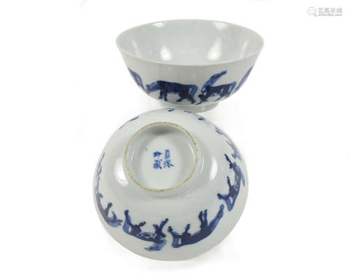 Each bearing Ruo shen zhen cang mark A pair of blue and white 'Eight Horses of Mu Wang' bowls