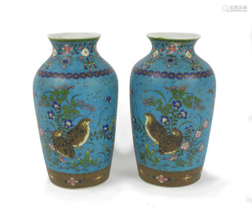 19th century A cloisonné enamel vase and a pair of cloisonné enamel and porcelain vases