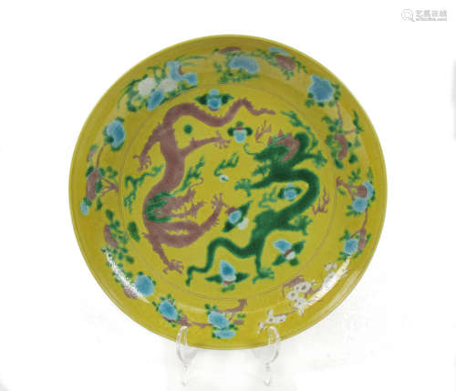 Kangxi six-character mark but later A yellow-ground 'dragon' saucer dish