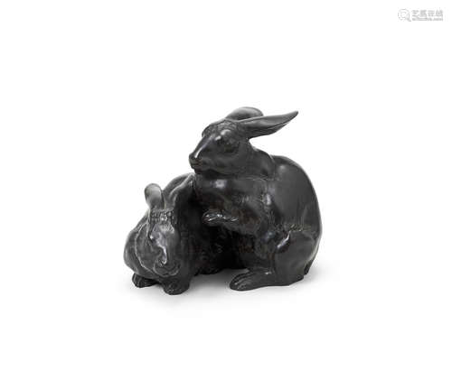 By Okazaki Sessei (1854–1921), Meiji era (1868-1912), late 19th/early 20th century A bronze okimono of two rabbits