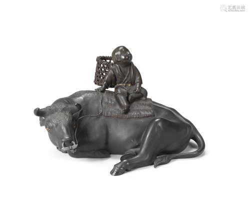 By Sekiguchi Shinya (1877-1932), Meiji era (1868-1912), late 19th/early 20th century A Bronze okimono of a boy on an ox