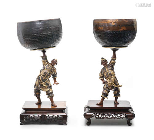 Taisho (1912-1868) or Showa (1926-1989) era, early 1900s A pair of gilt-bronze figures holding bells