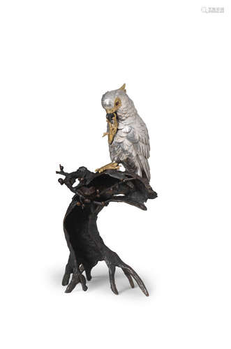 By Unbi, Meiji era (1868-1912), late 19th/early 20th century A gilt-bronze and silver okimono of a cockatoo on an en-suite bronze stand