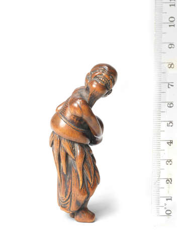 Edo Period (1615-1868), 18th century A wood netsuke of an emaciated man