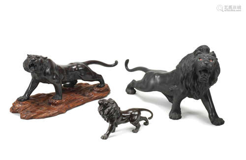 One lion by Kiyomitsu and the tiger by Watanabe, Meiji era (1868-1912), late 19th/early 20th century Three bronze animals