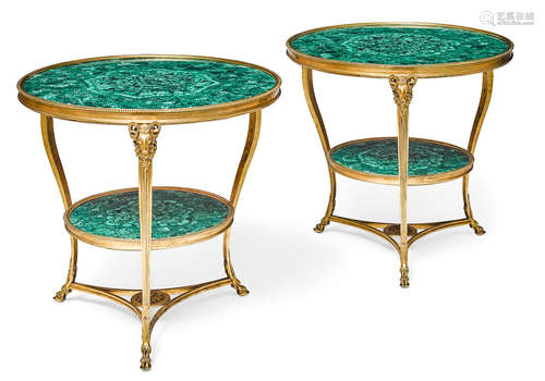 A pair of Louis XVI style gilt bronze and malachite gueridons