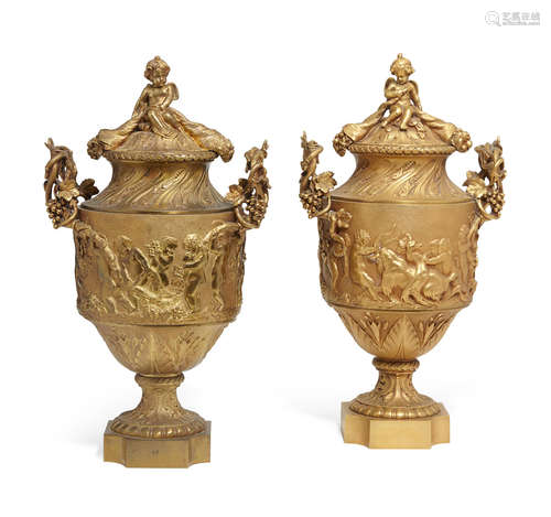 A pair of Louis XV style gilt bronze covered urns