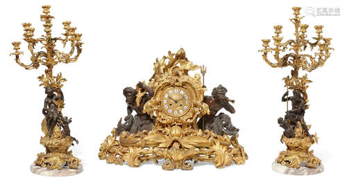 Possibly PicardSecond half 19th century A Louis XV style gilt and patinated bronze three piece figural clock garniture