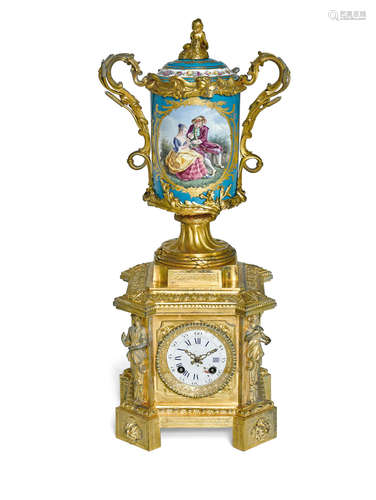 Second half 19th century A Louis XVI style gilt bronze mounted porcelain urn form clock