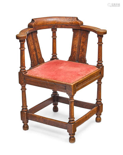 Fourth quarter 18th century A George III oak and elm corner armchair