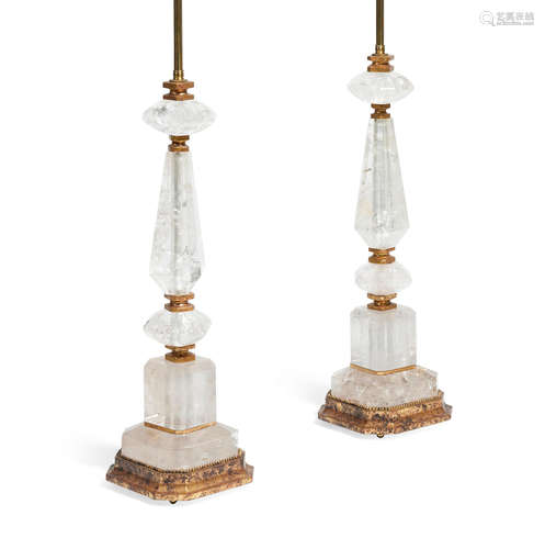 A pair of Alberto Pinto  gilt bronze and giltwood mounted rock crystal lamps