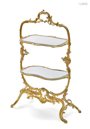 A Louis XV style gilt bronze and mirrored two tiered stand