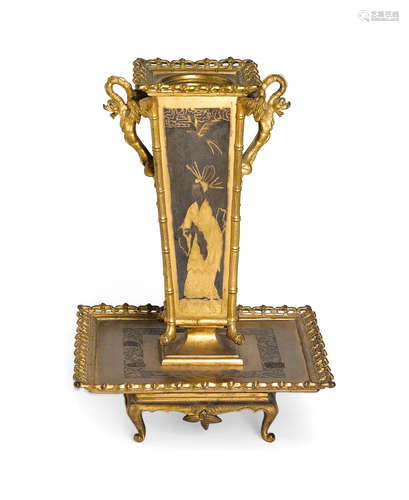 Fourth quarter 19th century A French Aesthetic movement patinated and gilt bronze centerpiece