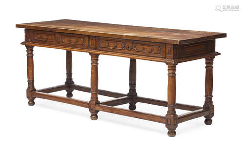 Early 18th century An Italian Baroque walnut library table