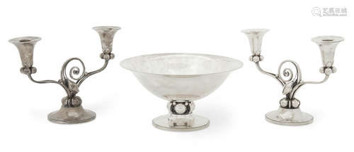 designed by Alphonse LaPaglia for International Silver Co, Meriden, CT, 20th century  A pair of American sterling silver Modernist two-light candelabra and a footed bowl