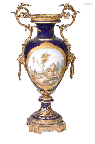 Late 19th/early 20th century A fine large Sèvres style porcelain gilt bronze mounted two handled urn