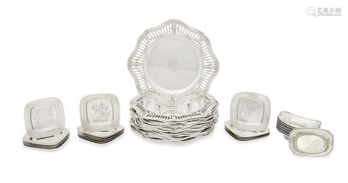 by Various Makers, 20th century  An assembled fourty-nine piece group of sterling silver plates and nut dishes