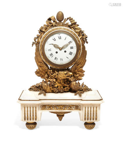 by Planchon, Paris, early 19th century A Louis XVI style gilt bronze mounted white marble mantel clock