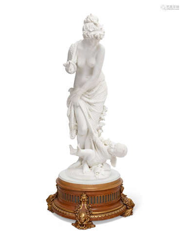 by Prof. E. Caruni, Florence19th century An Italian carved white marble group of a maiden capturing crying Cupid