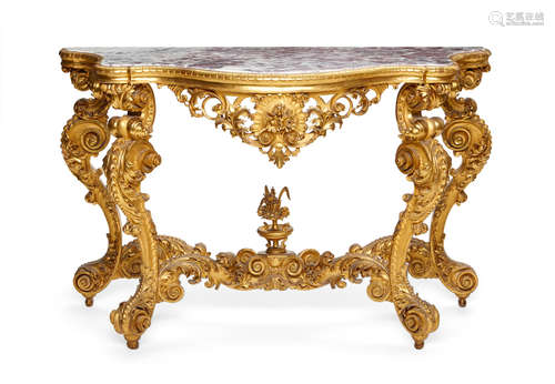 Second half 19th century An Italian Baroque style giltwood Fleur de Pêcher marble top console table