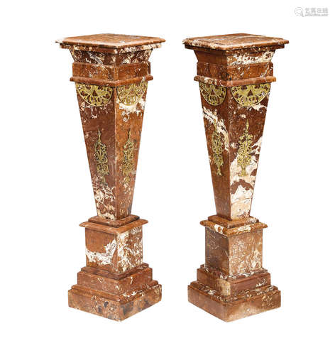 A pair of Neoclassical style gilt bronze mounted marble pedestals