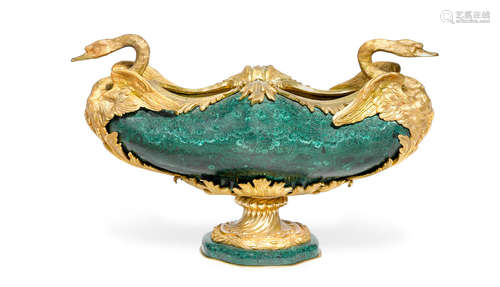 A Louis XVI style gilt bronze mounted malachite veneered swan form centerpiece