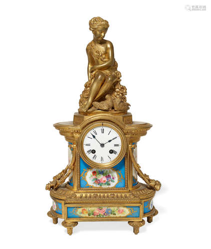 Late 19th/early 20th century A Sèvres style porcelain gilt bronze mounted mantel clock