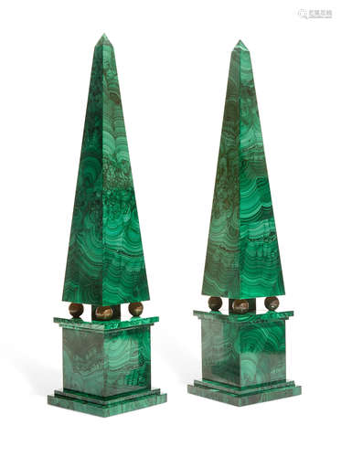 A pair of Neoclassical style malachite veneered obelisks