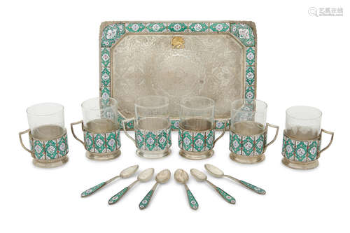 20th century  A Persian etched glass and enameled silver seven piece tea service