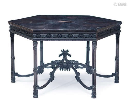 19th century A George III style carved mahogany hexagonal center table