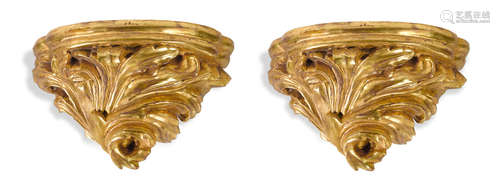 A pair of Roccoco Style giltwood wall brackets