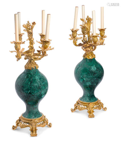 A pair of Louis XV style gilt bronze and malachite veneered four light candelabra