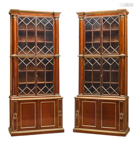 19th century  A pair of Russian Neoclassical style brass mounted mahogany bookcase cabinets