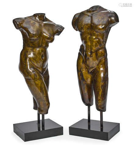 A pair of impressive patinated bronze male and female nudes