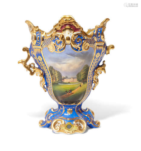 Third quarter 19th century A French porcelain two handled mantel vase with architectural vista or floral bouquet