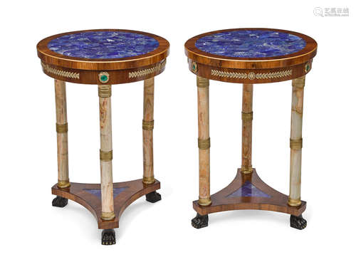 A pair of Empire style mahogany lapis and onyx and malachite bronze mounted guridons