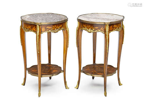 Late 19th/early 20th century A pair of Louis XV style gilt bronze mounted mahogany and marquetry marble top tables