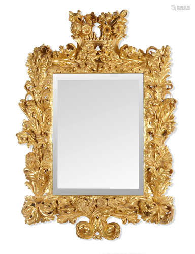 Late 19th century A Rococo style carved giltwood mirror